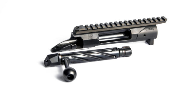 Deadline 2.0 Action featuring a precision-machined custom barreled action with a black matte finish and integrated rail system for mounting optics.