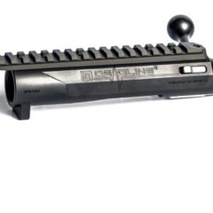 Close-up image of a black barreled action with a bolt handle, featuring a Picatinny rail and engraving of "Deadline 2.0 Action" on the receiver.