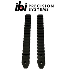 Two black metal rails with mounting holes, displayed vertically, designed as 40 MOA Rail For Deuce 2.0 by IBI Precision Systems, suitable for custom barreled actions and precision setups.