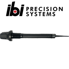 HMB Firing Pin Assembly shown horizontally with black metal spring and precision-machined components alongside the IBI Precision Systems logo on a white background.