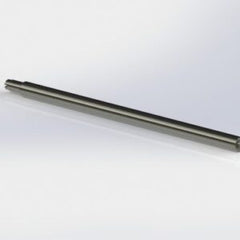 Rimfire Drop-In barrel component in a sleek metallic finish designed for precision shooting and easy installation in rimfire rifles.