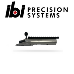 Side view of an HMB Tactical - Left Hand barreled action in satin finish, showcasing precision machining and integrated rail system for custom Remington 700 actions.